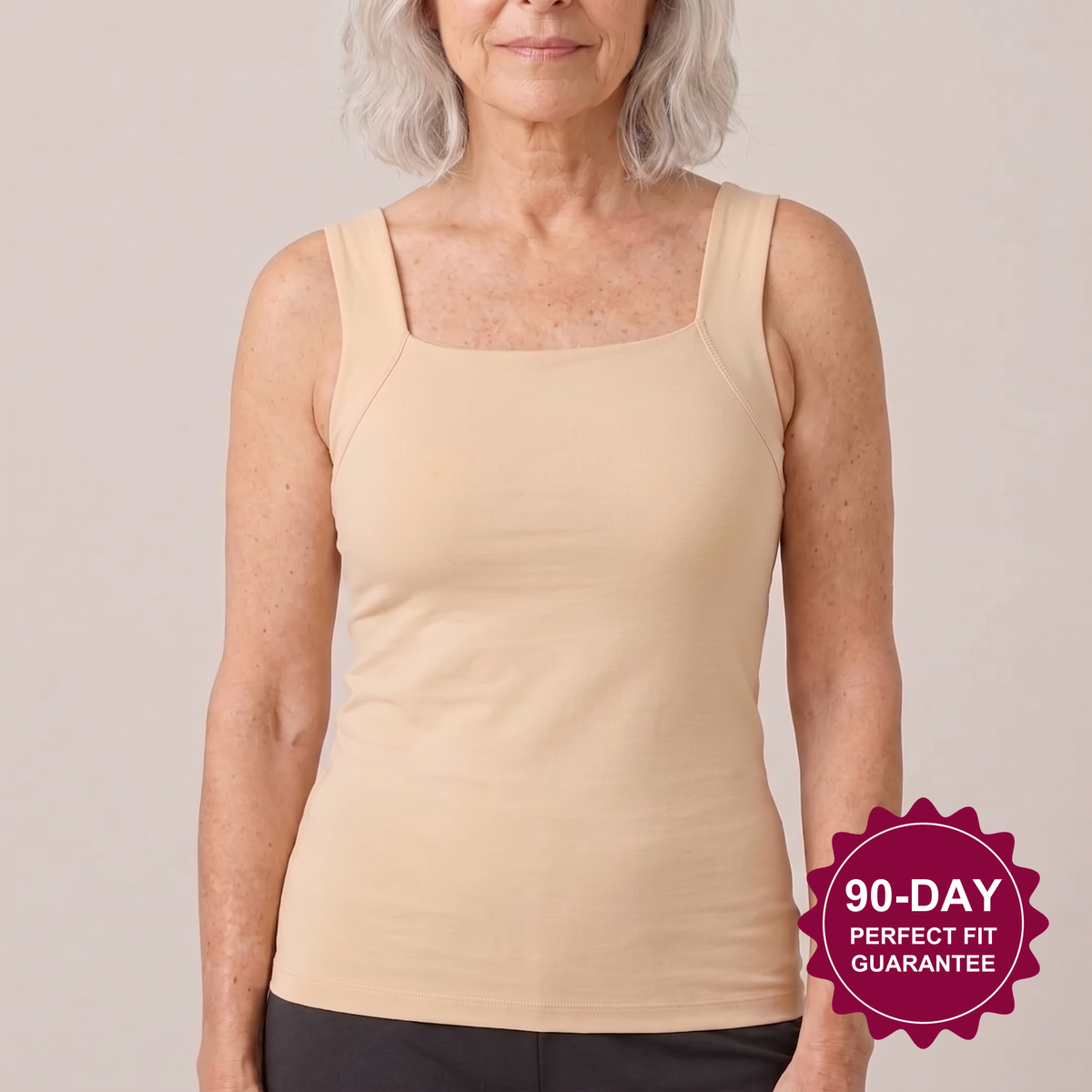 Woman over 50 wearing the nude Talina built-in bra tank, 90-day perfect fit guarantee